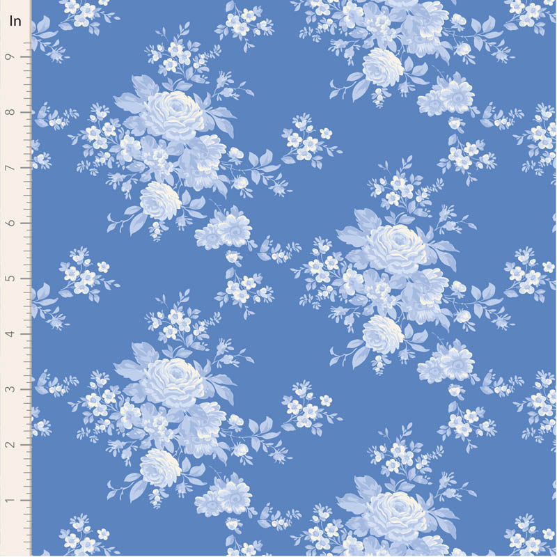Blue floral pattern fabric with white roses and small flowers, perfect for sewing projects and home decor.