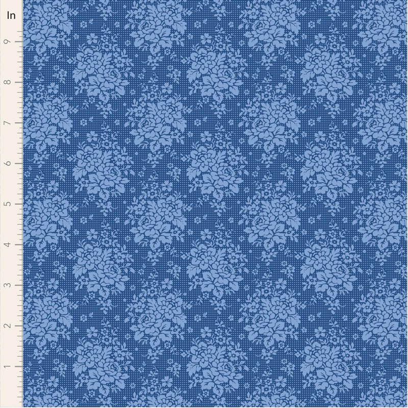 Blue floral cotton fabric with a textured pattern, perfect for sewing projects and crafts.