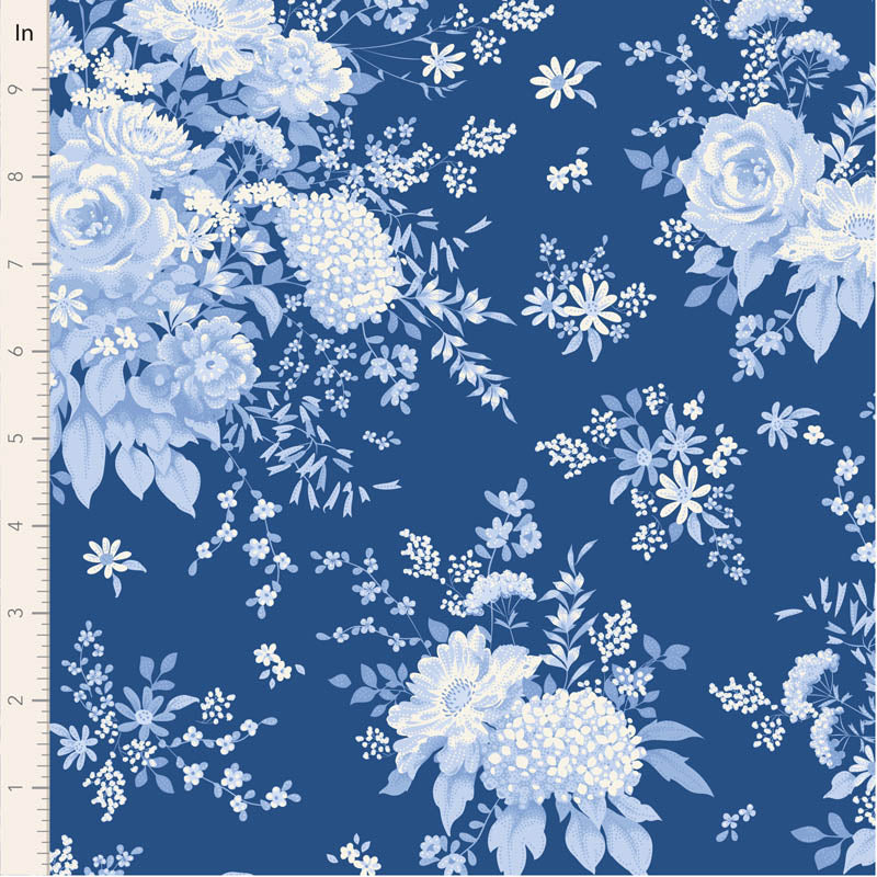 Blue floral fabric with beautiful white flowers and leaves, perfect for sewing and craft projects.