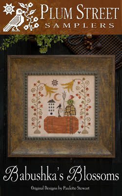 Framed embroidery design 'Babushka's Blossoms' by Plum Street Samplers, featuring floral motifs and vibrant colors.