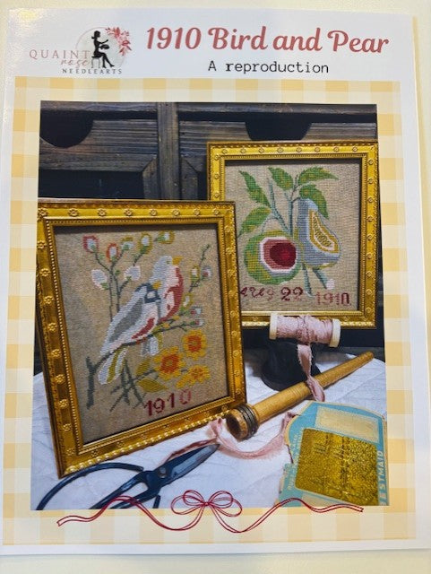 Framed 1910 Bird and Pear artwork reproduction, featuring colorful designs on linen with vintage scissors and thread.