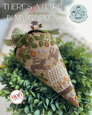 Handcrafted fabric cone decor featuring a hare design, in earthy tones, perfect for garden-themed decor.