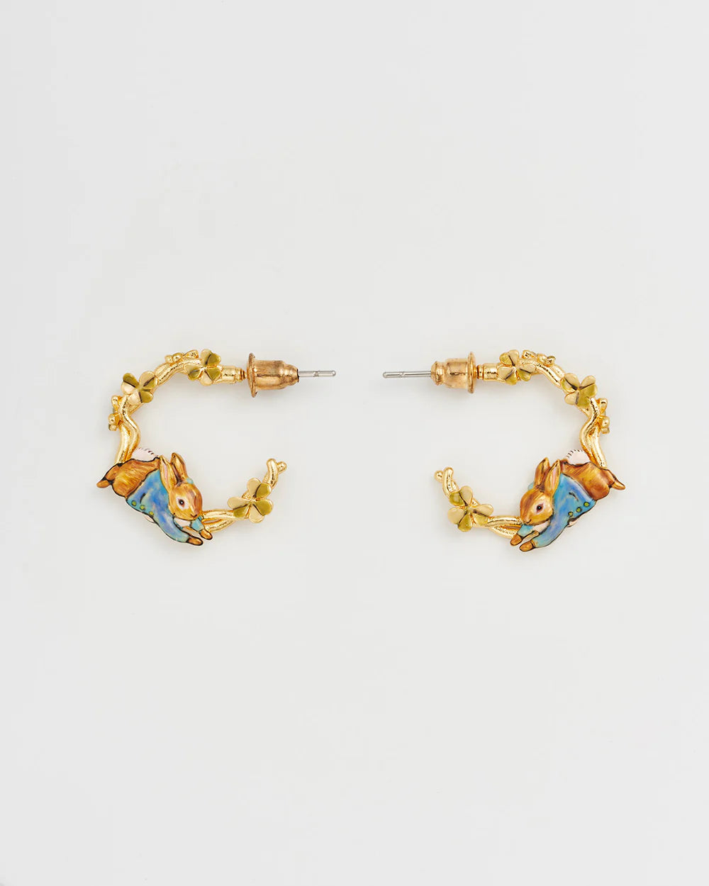 Gold hoop earrings featuring colorful rabbit design and leaf accents, crafted from metal.