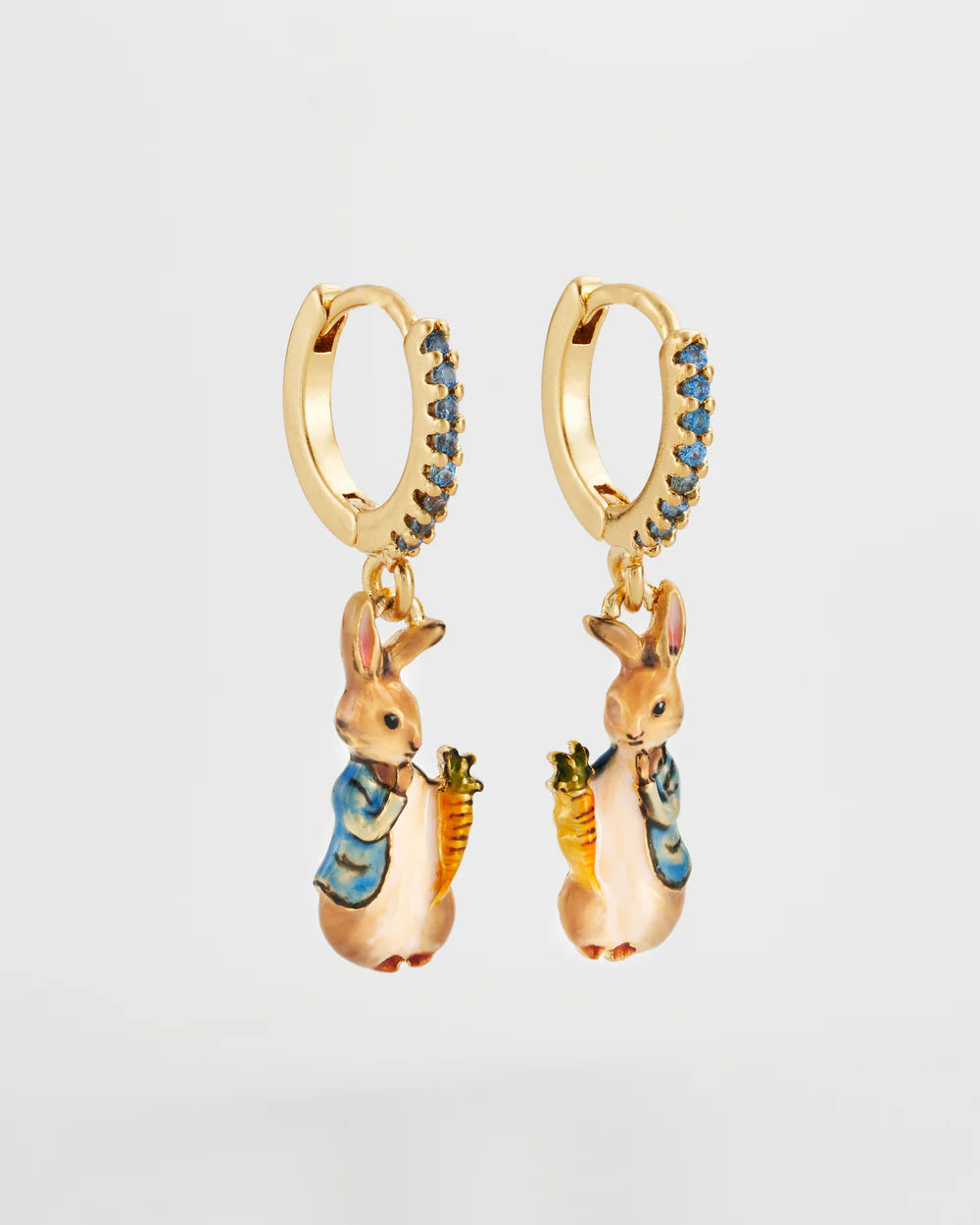 Gold hoop earrings with colorful rabbit charms and blue rhinestone accents, whimsical jewelry for animal lovers.