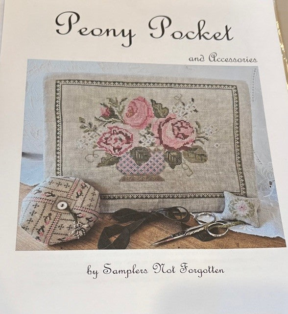 Peony Pocket cross-stitch kit featuring pink roses, decorative accessories, linen fabric, by Samplers Not Forgotten.