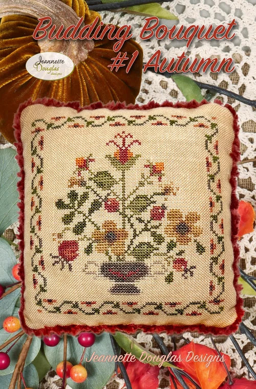 Budding Bouquet #1 Autumn decorative pillow, floral design, cross-stitch, beige fabric with red trim.
