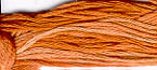 Soft orange embroidery thread bundle, perfect for stitching and crafting projects.
