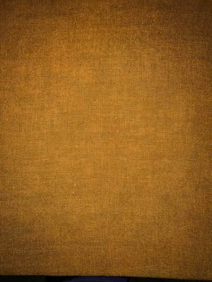 Brown textured fabric material ideal for upholstery or crafting projects.