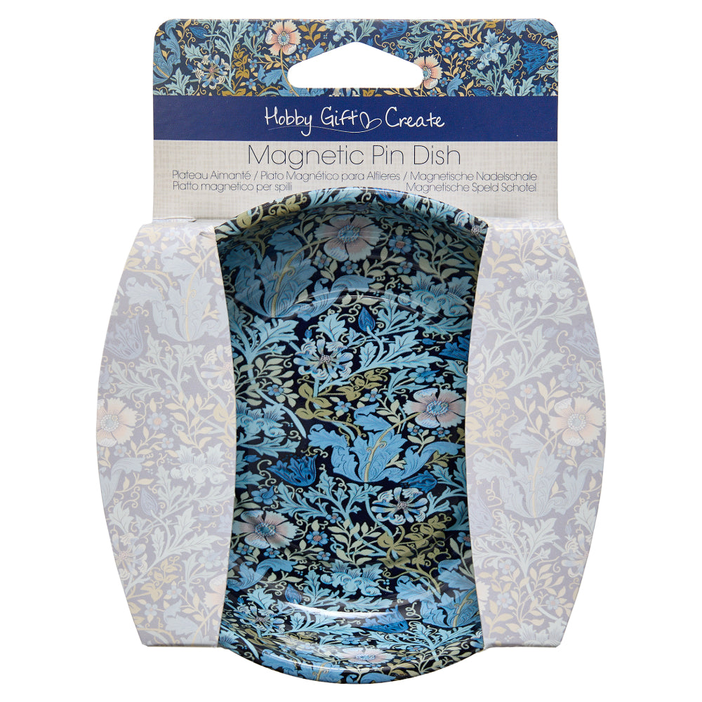 Magnetic pin dish in floral blue design, perfect for holding pins and small items while sewing.