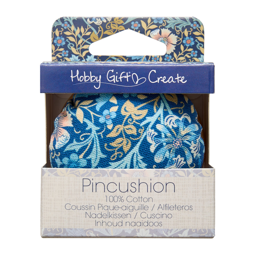 Floral blue pincushion made of 100% cotton in decorative packaging.