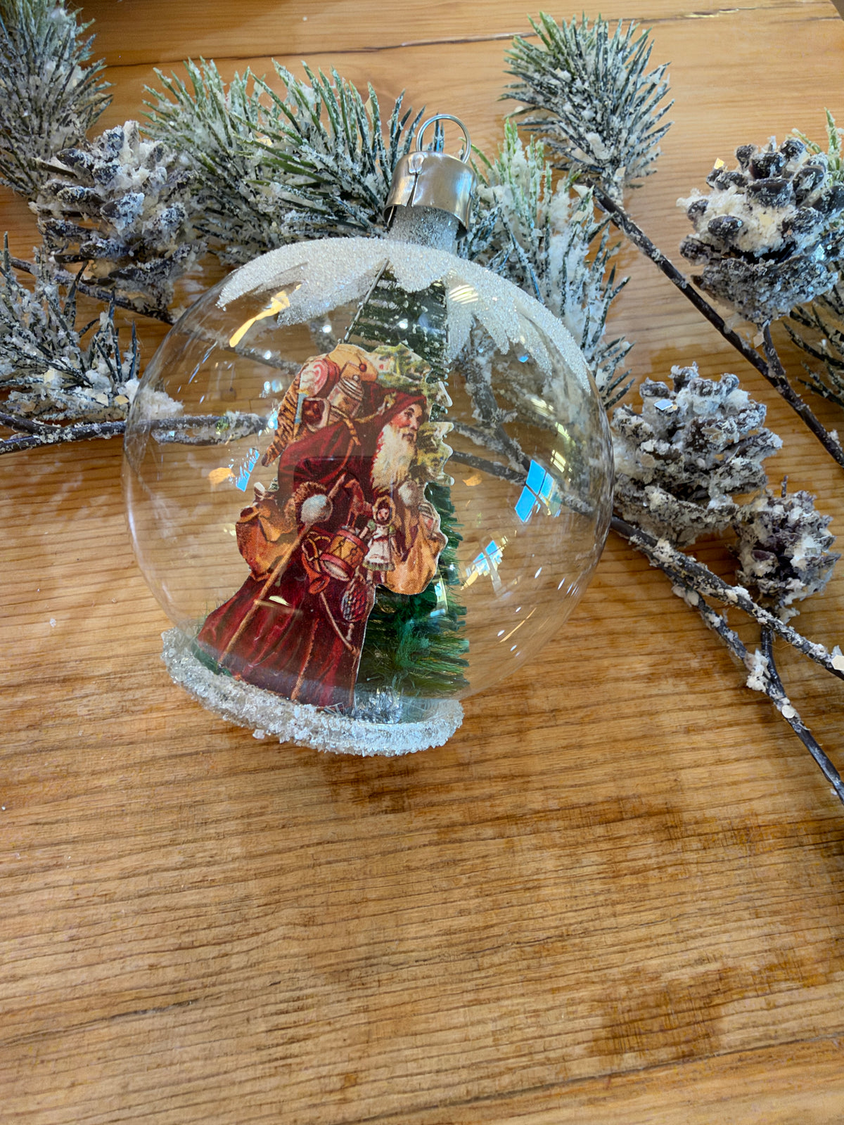 Nostalgie Handmade Ornament from Germany {Diorama Santa holding Toy Sack}