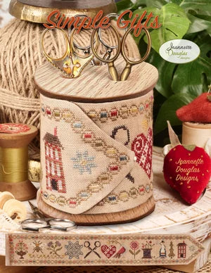 Decorative wooden sewing storage with vintage scissors, embroidered details, and a cozy crafting theme.