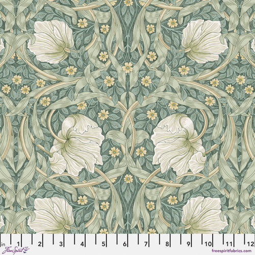 Floral fabric featuring white blooms on a green background, perfect for quilting and sewing projects.