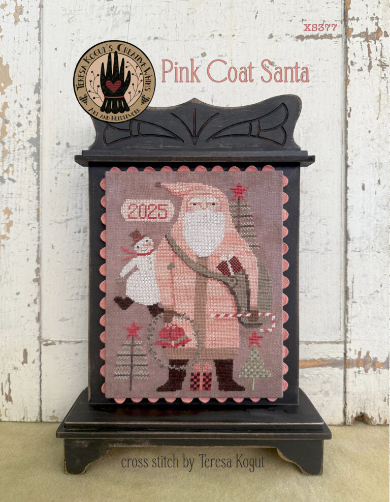Pink Coat Santa cross stitch by Teresa Kogut, featuring snowman, trees, and festive elements.