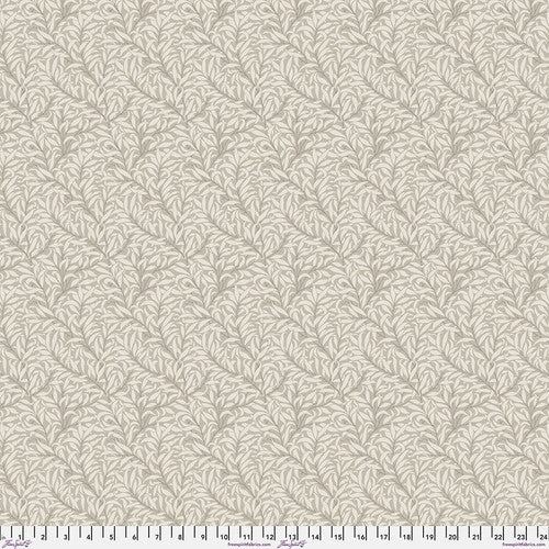 Elegant beige leaf-patterned fabric, perfect for upholstery or sewing projects.
