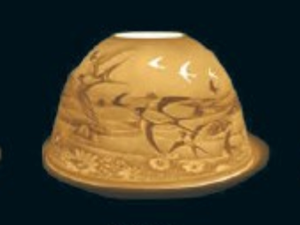 Elegant beige ceramic lamp shade with floral and bird engravings, perfect for home decor.