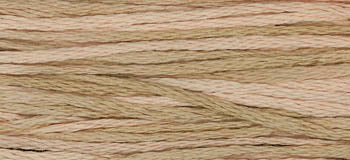 Natural cotton embroidery thread in soft beige and cream shades, perfect for crafting and stitching projects.