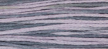Variegated embroidery floss in shades of lavender and grey, ideal for crafting and sewing projects.