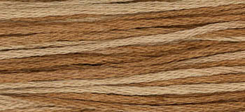 Multi-colored embroidery floss in shades of brown and beige, perfect for crafting and stitching projects.