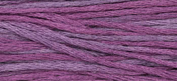 Variegated embroidery thread in shades of purple, made from soft cotton for vibrant crafting projects.