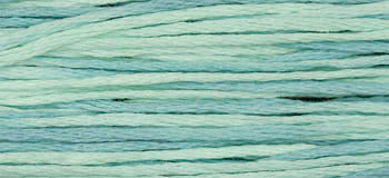 Light teal cotton yarn, perfect for crafting and knitting projects, soft texture, versatile for various designs.