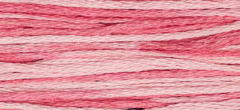 Cotton embroidery thread in shades of pink, ideal for crafting and stitching projects.