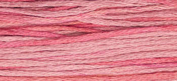 Gradient pink embroidery floss, perfect for crafts and sewing projects, made from soft cotton.