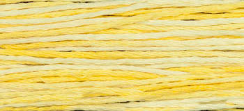 Soft yellow cotton yarn, perfect for knitting and crocheting projects, showcasing a gradient color blend.