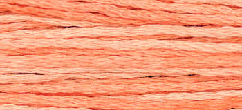 Cotton embroidery floss in light coral, perfect for DIY crafts and detailed stitching projects.