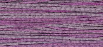Variegated embroidery thread in shades of purple and gray, ideal for sewing and crafting projects.