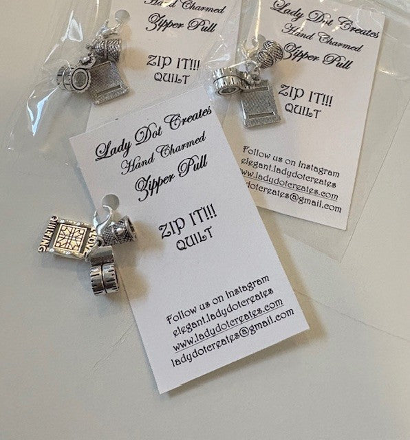 Handcrafted silver zipper pull charms with quilt-themed designs by Lady Dot Creates.