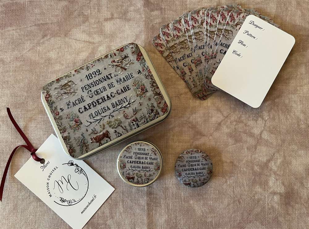 Vintage-style gift tin set featuring decorative cards and coasters, floral design, metal and paper materials.