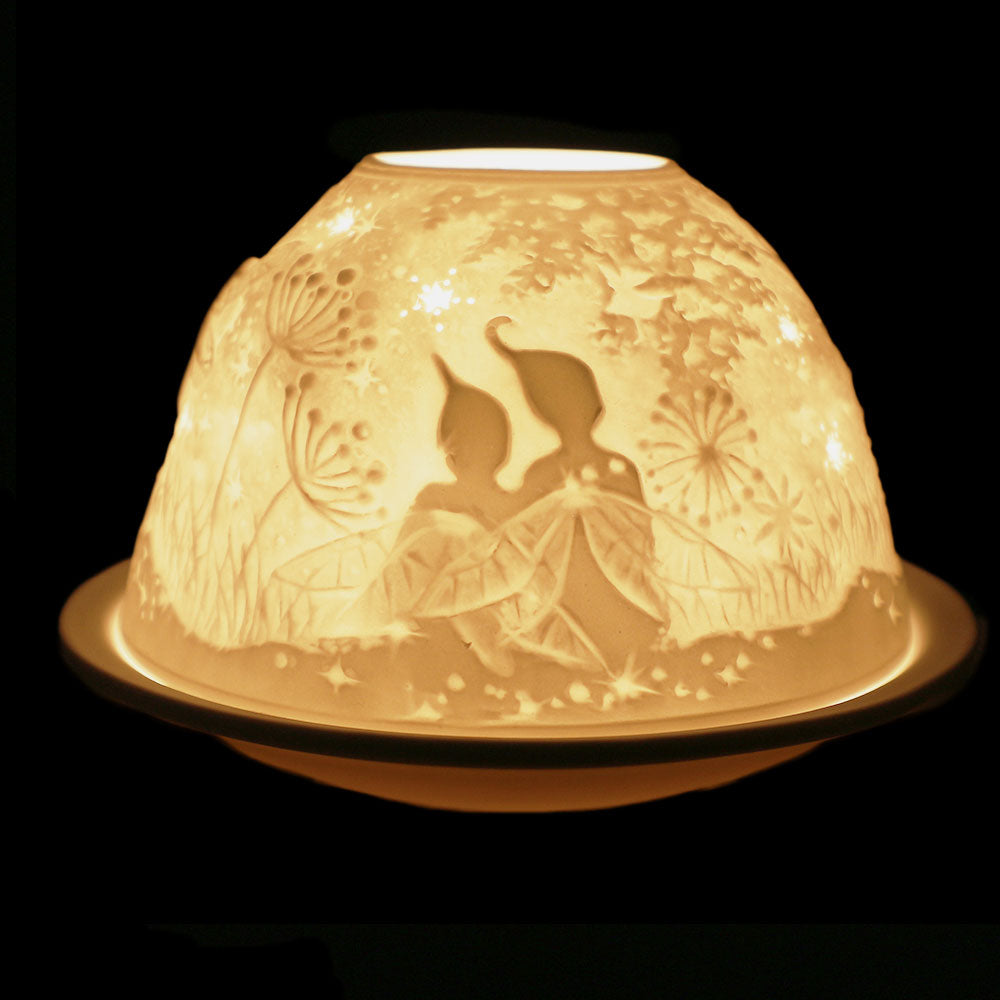 Elegantly crafted ceramic lamp with fine fairy design, warm glow, perfect for home decor.