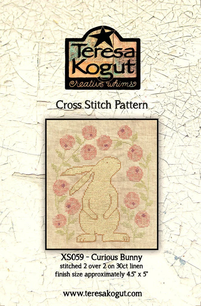 Curious Bunny cross stitch pattern, 4.5" x 5", stitched on 30ct linen with floral design.