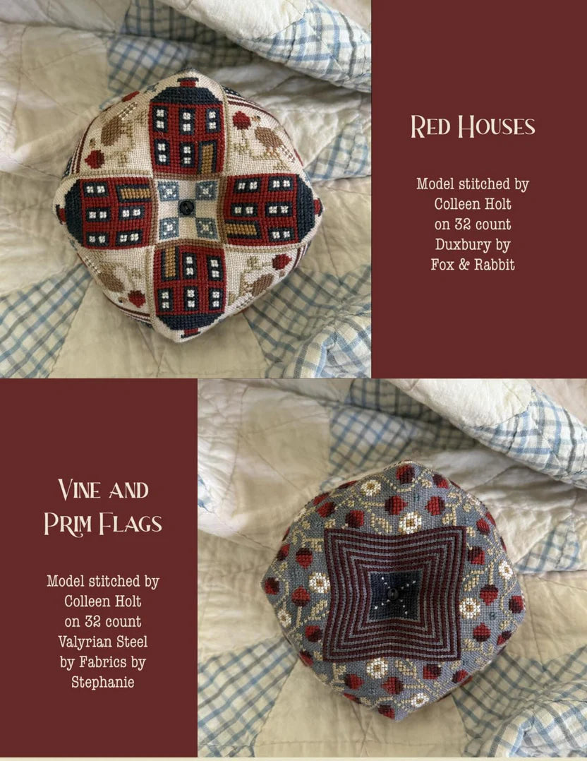 Handmade decorative pincushion in red and gray, stitched on 32 count fabric, featuring house and flag designs.