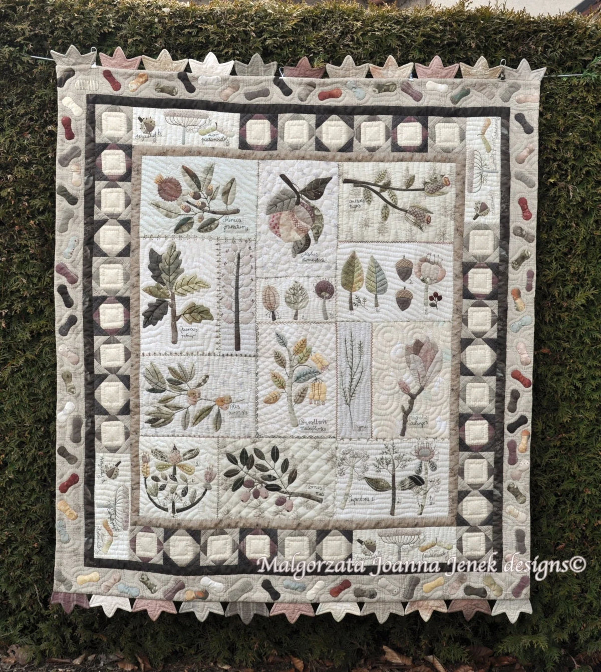 Handcrafted botanical quilt, beige and gray, featuring floral designs and intricate stitching, 80x80 cm