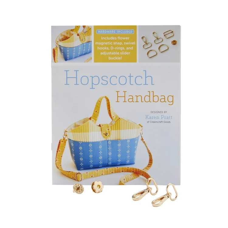 Hopscotch handbag kit in blue and yellow, includes magnetic snap and adjustable slider buckle.