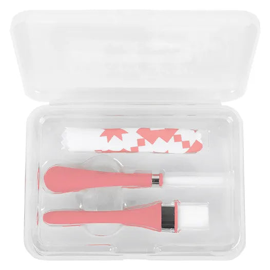 Pink cosmetic tool set with brushes and applicators in a clear storage case.