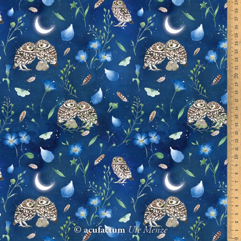 Blue owl patterned fabric featuring floral designs, perfect for crafts or home decor.