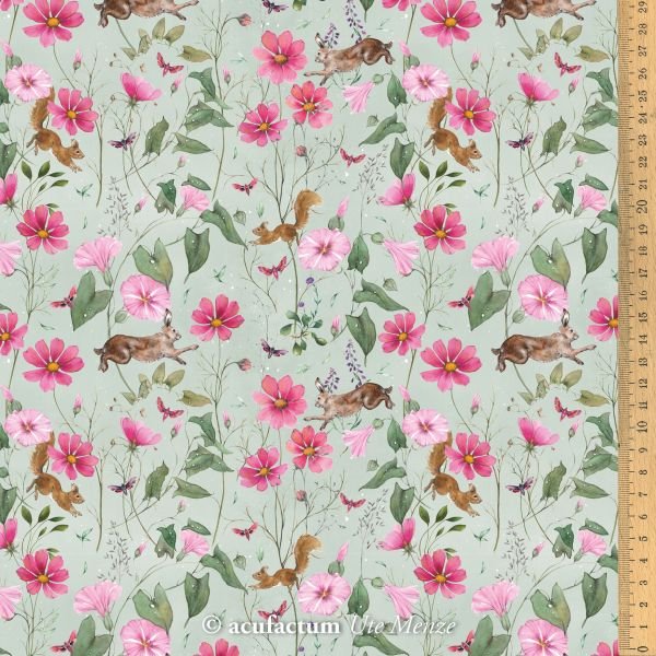 Floral fabric featuring pink flowers and playful squirrels on a light green background, ideal for crafting.