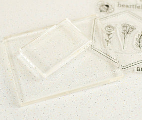 Set of clear acrylic stamping blocks, rectangular and hexagonal shapes, ideal for craft projects.